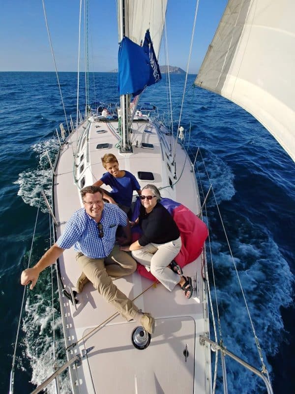 a man riding on the back of a boat